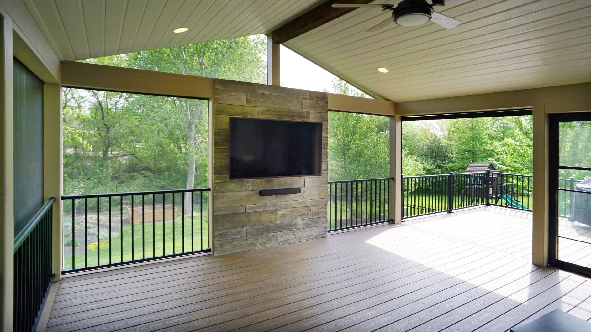 Completed screened porch with tongue-and-groove ceiling and full-perimeter screen system in Rockwall.